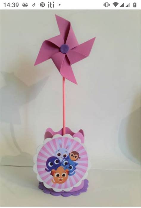 Cute Pinwheel With Cartoon Characters And Pink Flower