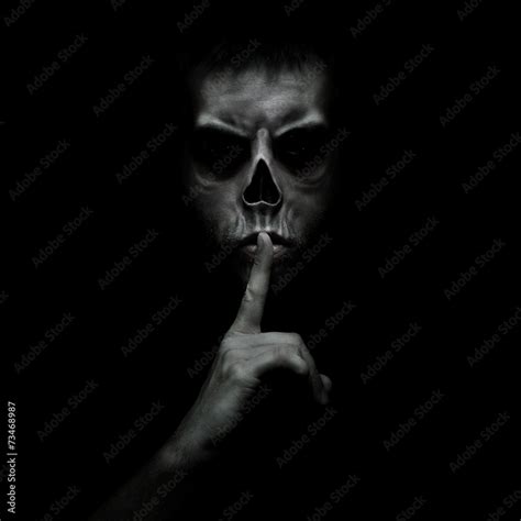 Evil Man Gesturing Silence Quiet Isolated On Black Background Stock