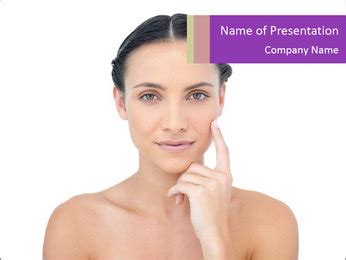 Stunning Nude Model With Finger On Cheek In A White Backdrop For Photoshoot PowerPoint Template