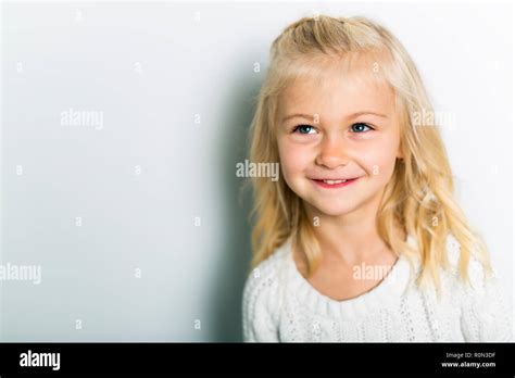 Cute girl 4-5 year old posing in studio Stock Photo - Alamy
