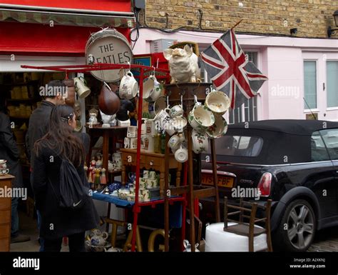 Busy stalls in Portobello Road market London Stock Photo - Alamy