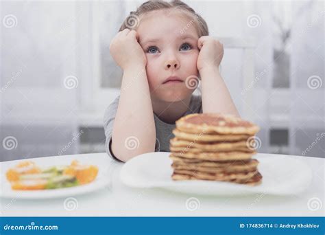 Diet For Children Sad And Unhappy Little Girl Stock Photo Image Of