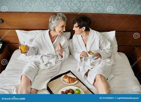 A Senior Lesbian Couple Sitting Together Stock Image Image Of Rest Hotel