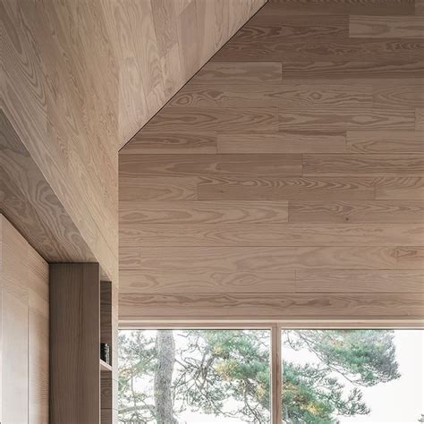 The Interior Of A House With Wood Paneling On The Walls And Floor