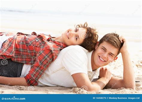 Romantic Young Couple Relaxing On Beach Stock Image Image Of Outside