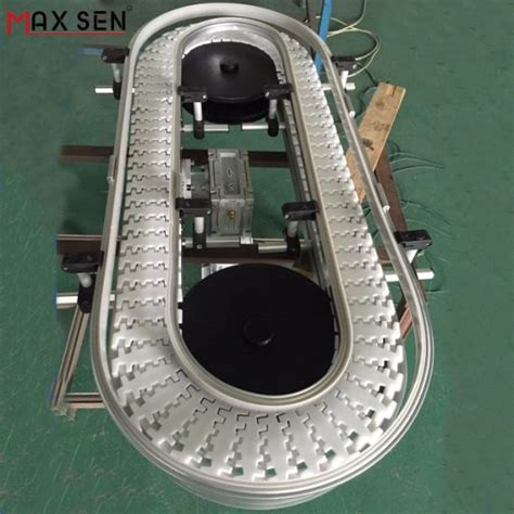 China White Drag Chain Conveyor Chain Plate Conveyor Flexible Conveyor China Flexible Chain