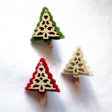 Lot de 3 mini pinces à linges décoratives pour noël représentant des