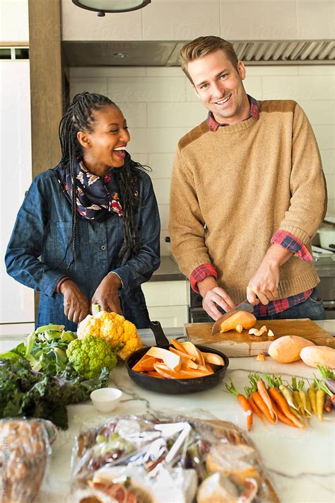 Couple Cooking In Kitchen By Stocksy Contributor Jill Chen Stocksy