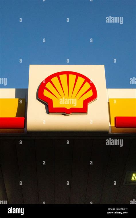 The Shell Logo On Branding On A Petrol Station Forecourt In England Uk