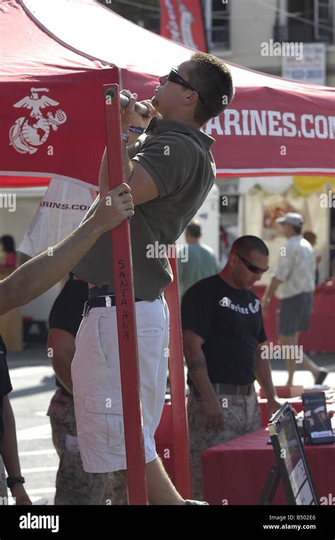 Visitors To A Us Marine Corps Recruiting Booth At A Street Fair Stock