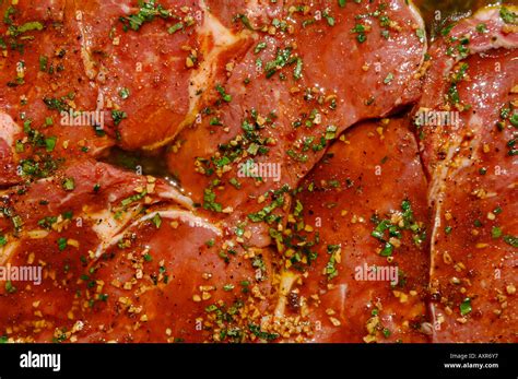 Marinating Rib Eye Steaks Stock Photo Alamy