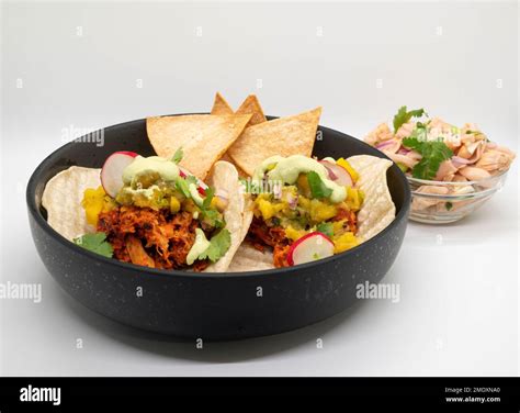 Healthy Vegan Jackfruit Tacos In A Black Bowl On White Background Stock