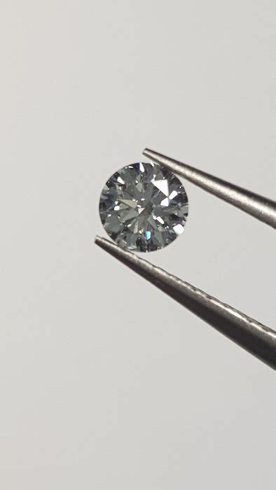 1 Pcs Diamante 0 30 Ct Brillante E VVS2 Catawiki