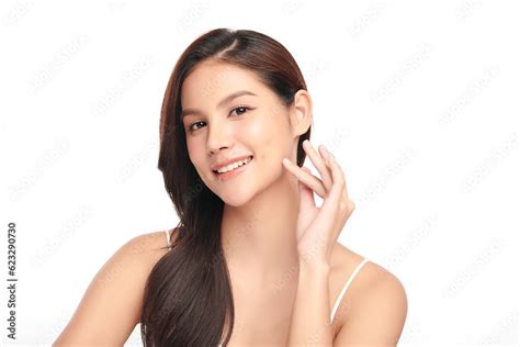 Beautiful Young Asian Woman With Clean Fresh Skin On White Background