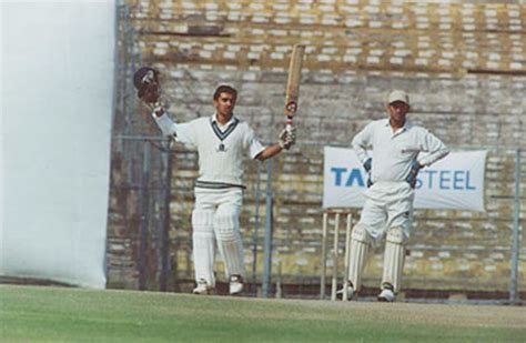 Rohan Gavaskar acknowledges the dressing room after reaching his ...