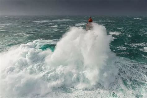 Dramatic Photos As Massive Waves Completely Engulf Lighthouse In Huge