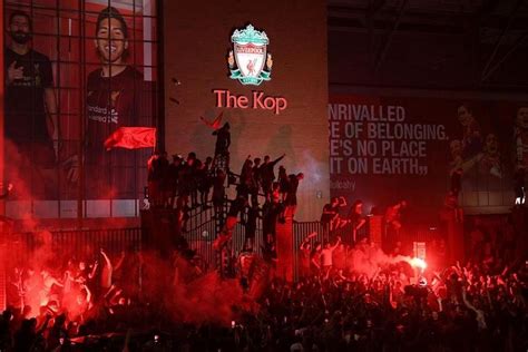 Football: Liverpool fans turn the city red in celebration after team ...