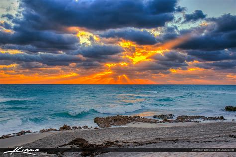 Beach Sunrise with Sunrays Through Clouds