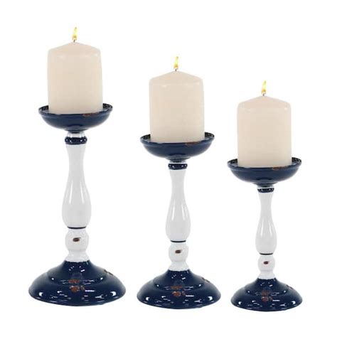 Litton Lane White Iron Baluster Shaped Candle Holders With Blue Base