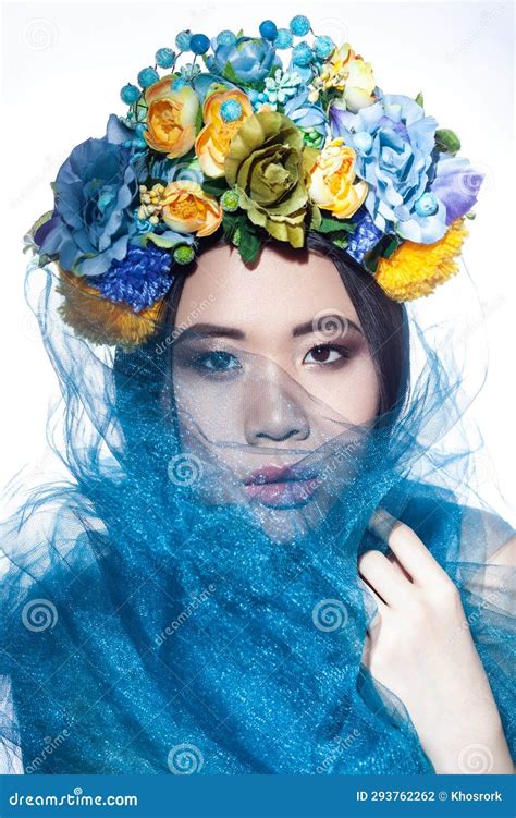 Sensual Attractive Beautiful Woman With Floral Hat And Blue Veil