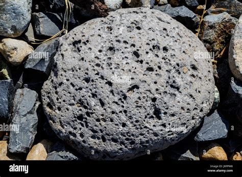 Volcanic ejecta at the foot of a large cinder cone near Crater Lake ...