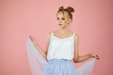 Premium Photo Laughing Blonde Woman Wearing In Denim Shirt Posing Over Pink Background