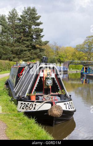 Canal Narrowboat On The Trent And Mersey Canal Passing The Old Derelict