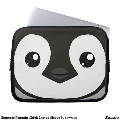 A Black And White Laptop Case With A Penguin Face