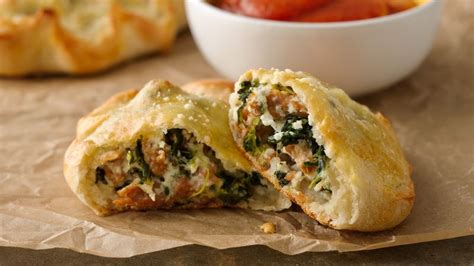 Spinach Ricotta And Sausage Calzones Recipe From Betty Crocker