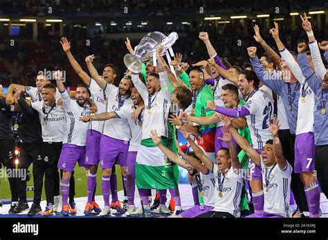 Sergio Ramos Lifts The Trophy As Real Madrid Celebrate After Winning
