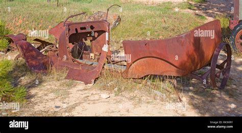 Abandond rusty wrecks of the old car Stock Photo - Alamy