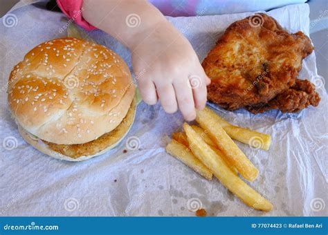 Hand of a Little Girl Ready To Eat Fast Food Stock Image - Image of ...