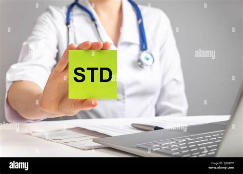 Std Medical Disease Abbreviation In Doctor Hands High Quality Photo