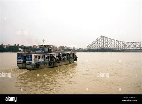 Boating in Hooghly river ; Howrah Bridge now Rabindra Setu ; Calcutta ...