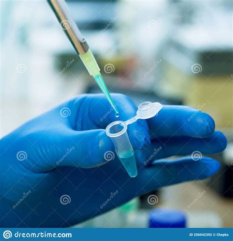 Scientist with Test Tubes and Flasks Conducting an Experiment in a Science Lab Stock Photo ...