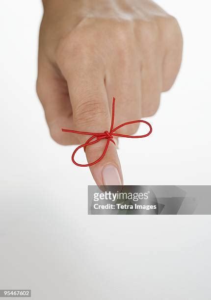 Red String Finger Photos And Premium High Res Pictures Getty Images