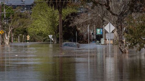 Man Found Dead In Flooded Backyard As Australia Braces For More Heavy