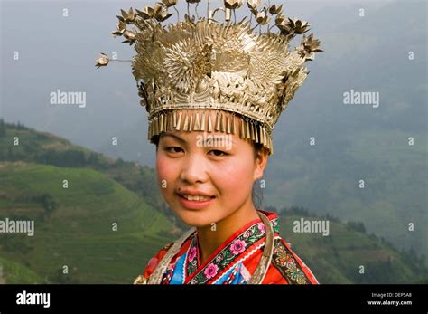 Young miao woman wearing traditional hi-res stock photography and ...