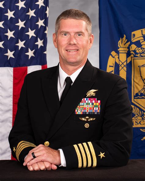 Captain Walter H Allman Iii Usn Commandant Of