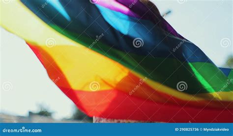 Woman Holding The Rainbow Flag And Enjoying Blue Sky Beautiful The