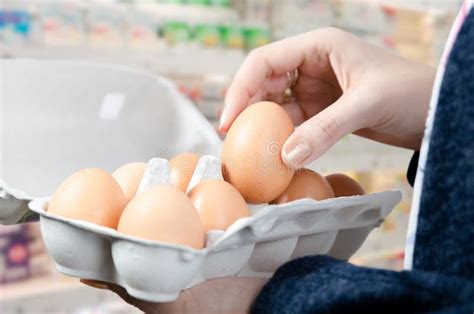 Woman Buys Eggs In The Supermarket Stock Image Image Of Food