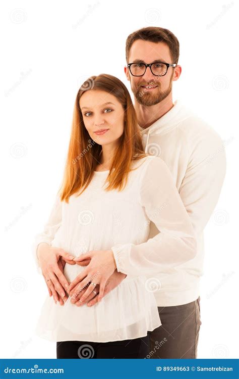 Beautiful Pregnant Woman And Man Standing Isolated Over White Stock