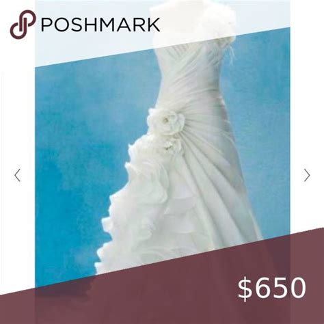 A White Dress With Flowers On It And The Price Is 65 00 At Poshmark