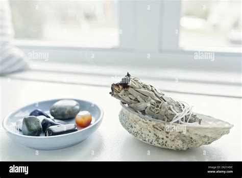 White sage burning cleansing crystals Stock Photo - Alamy