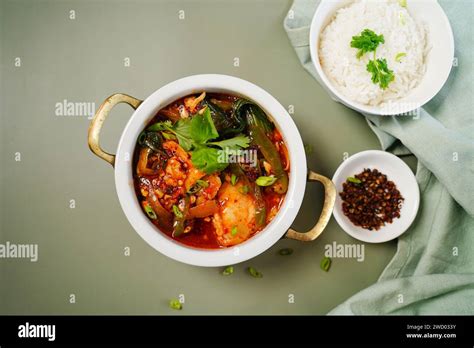 Spicy Chinese Style Sichuan Fish Hot Pot Served With Jasmine Rice Stock Photo Alamy