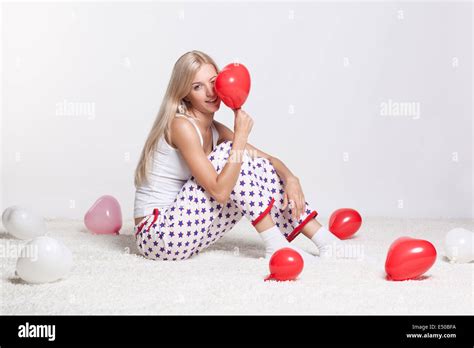 Blonde Woman With Balloons Stock Photo Alamy