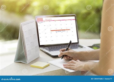 Businesswoman Planning Agenda And Schedule Using Calendar Event Stock