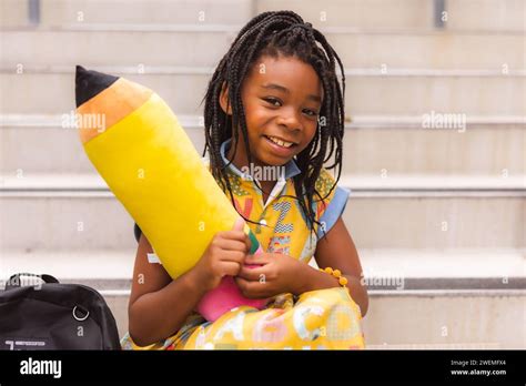 African American Girl Fist Day Of School Year Stock Photo Alamy