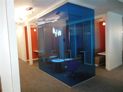 Custom color tinted glass offices with frameless glass by Nello Wall ...