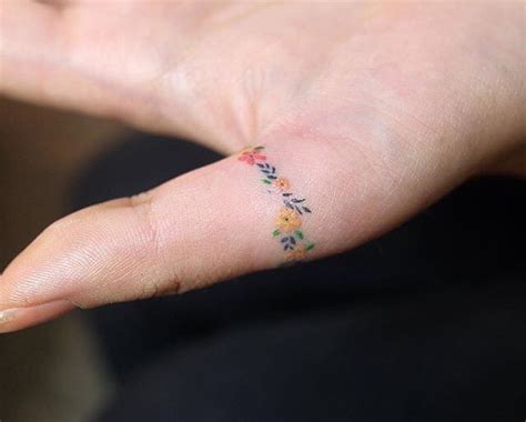 Small Finger Tattoo By Zihee Tattoo Insider